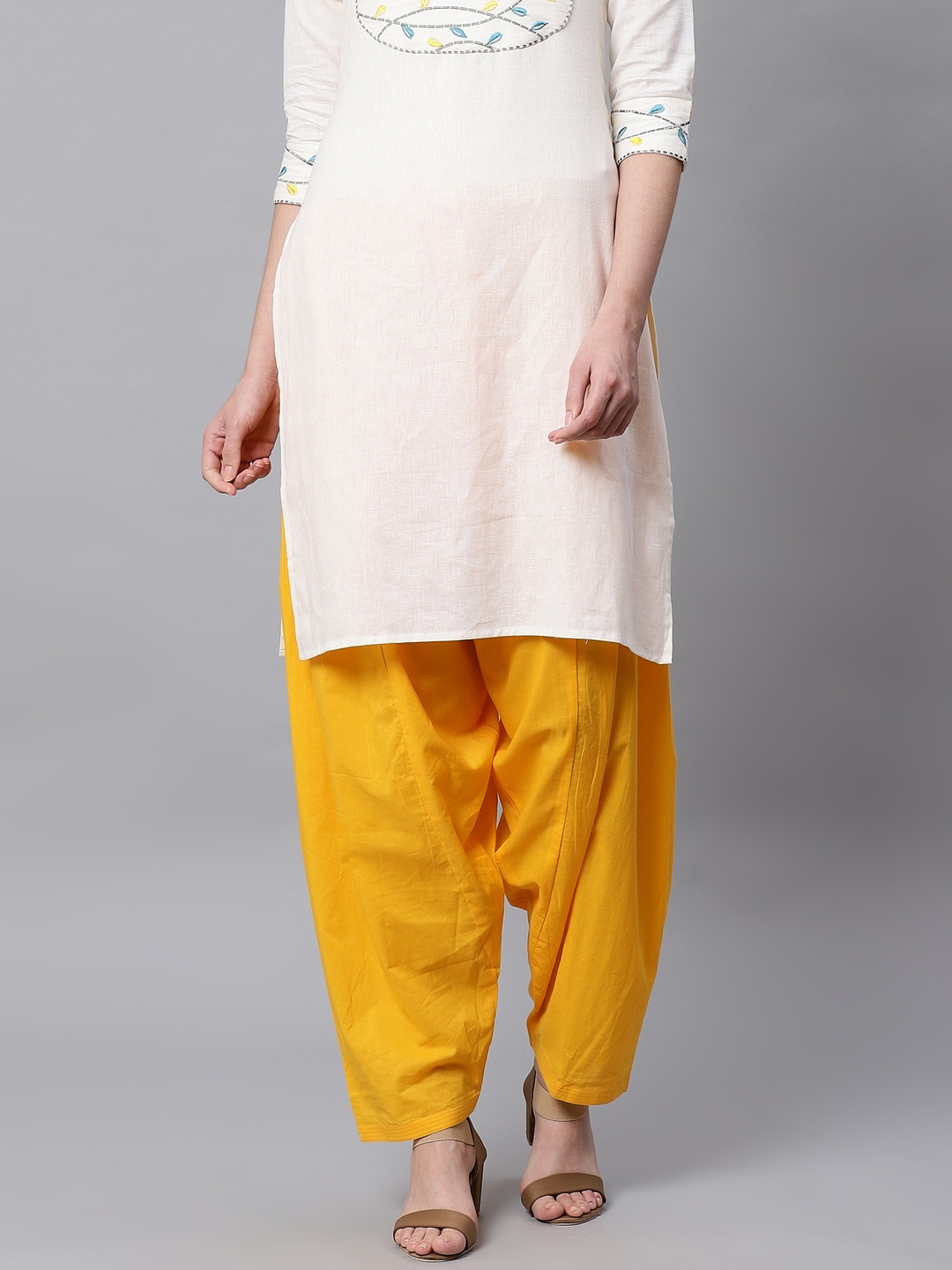 

Kifahari Women Mustard Yellow Solid Loose Fit Salwar