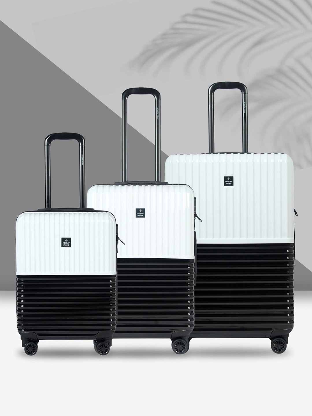 

Nasher Miles Istanbul Hard ABS & PC Set of 3 S/M/L Black White Trolley Bags 55-65-75cm