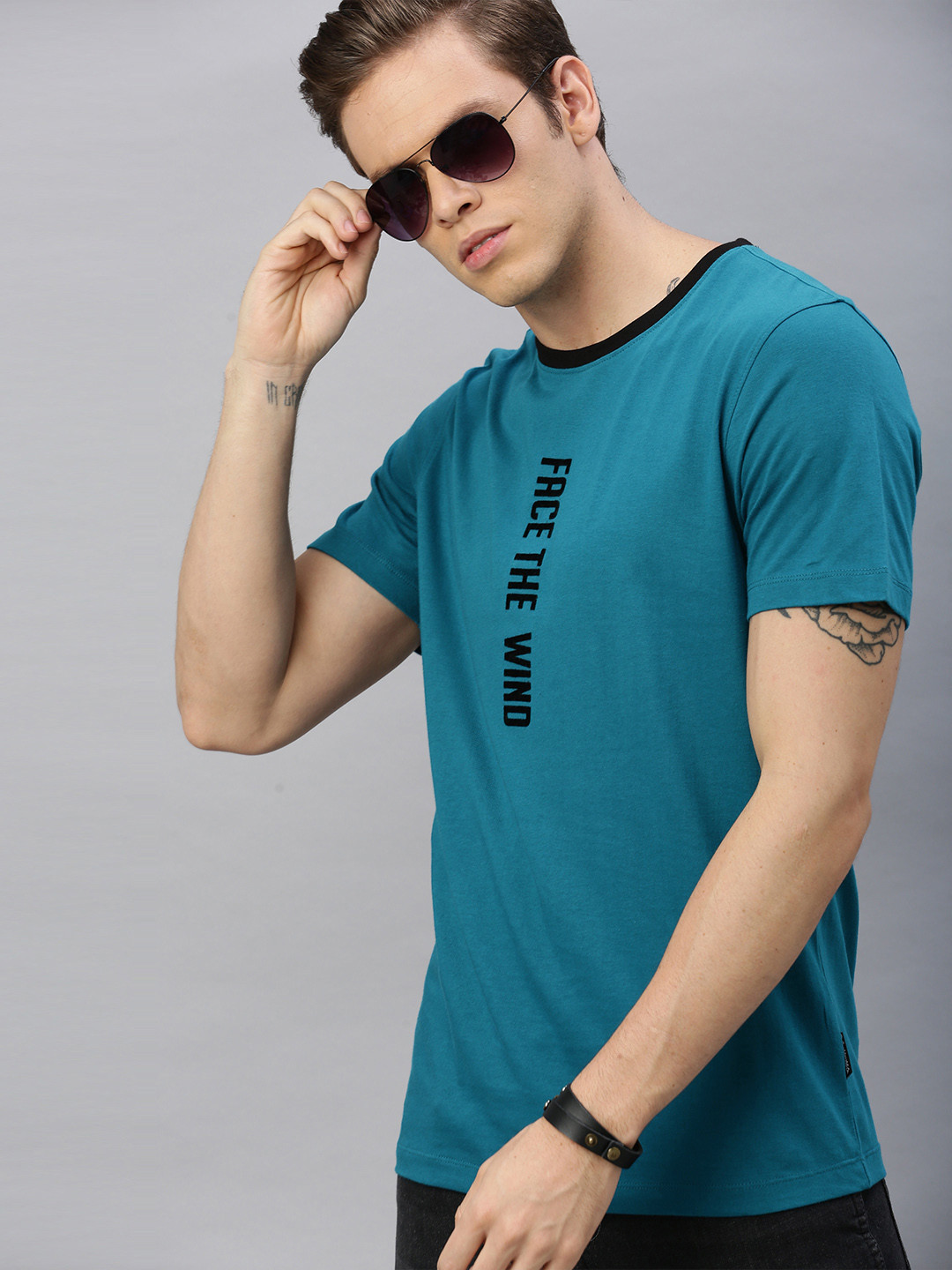

Roadster Men Teal Blue Printed Round Neck T-shirt