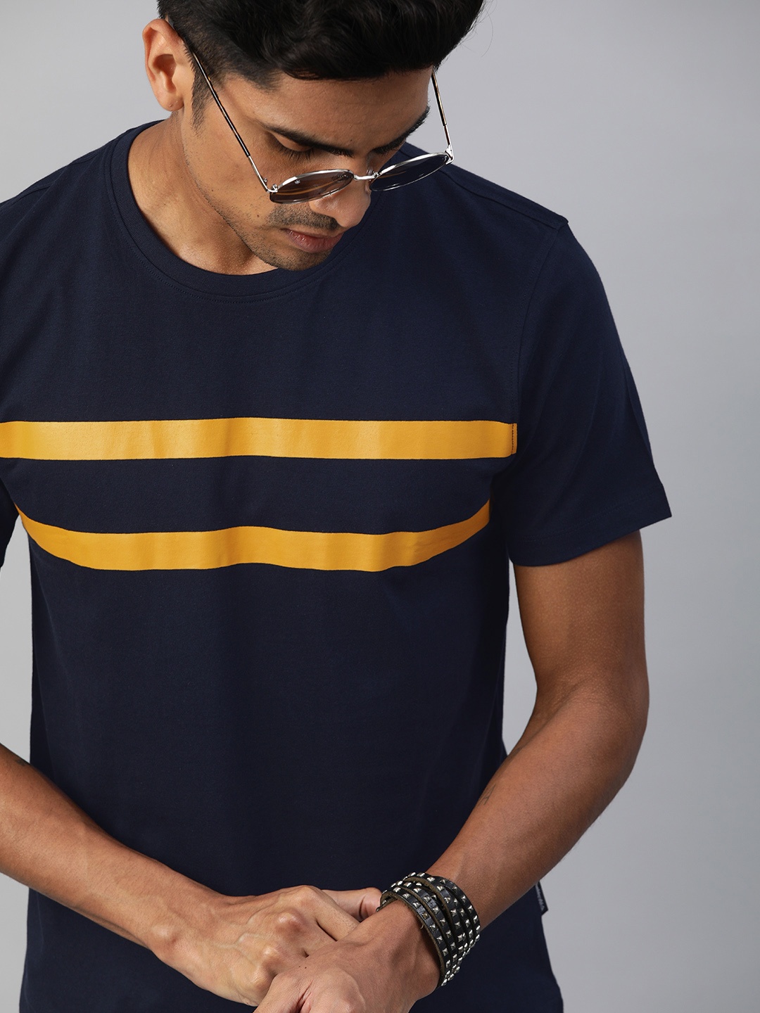 

Roadster Men Navy Blue Yellow Striped Round Neck Pure Cotton T-shirt