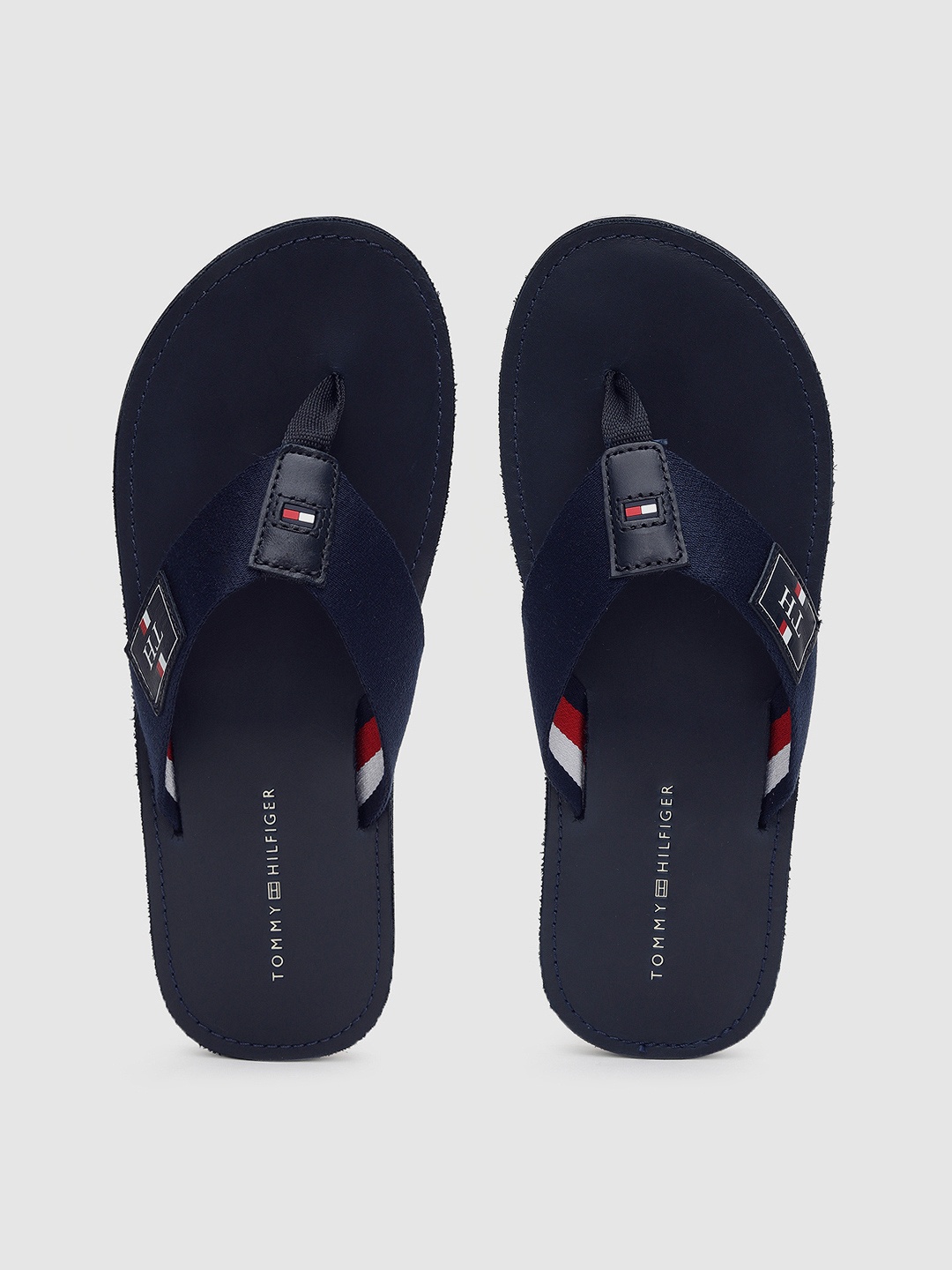 

Tommy Hilfiger Men Navy Blue Solid Thong Flip-Flops