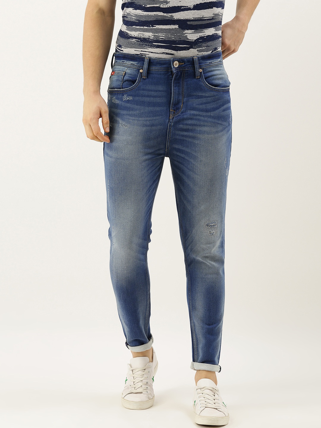 

Lee Cooper Men Blue Cyril Carrot Fit Mid-Rise Low Distress Stretchable Jeans