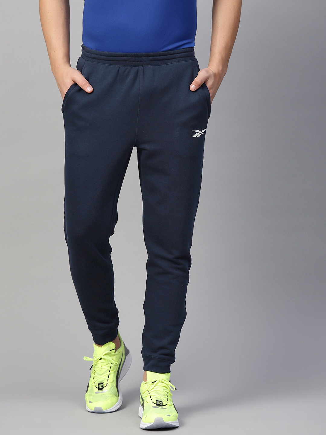 

Reebok Men Navy Training Essentials Linear Logo French Terry Joggers, Navy blue