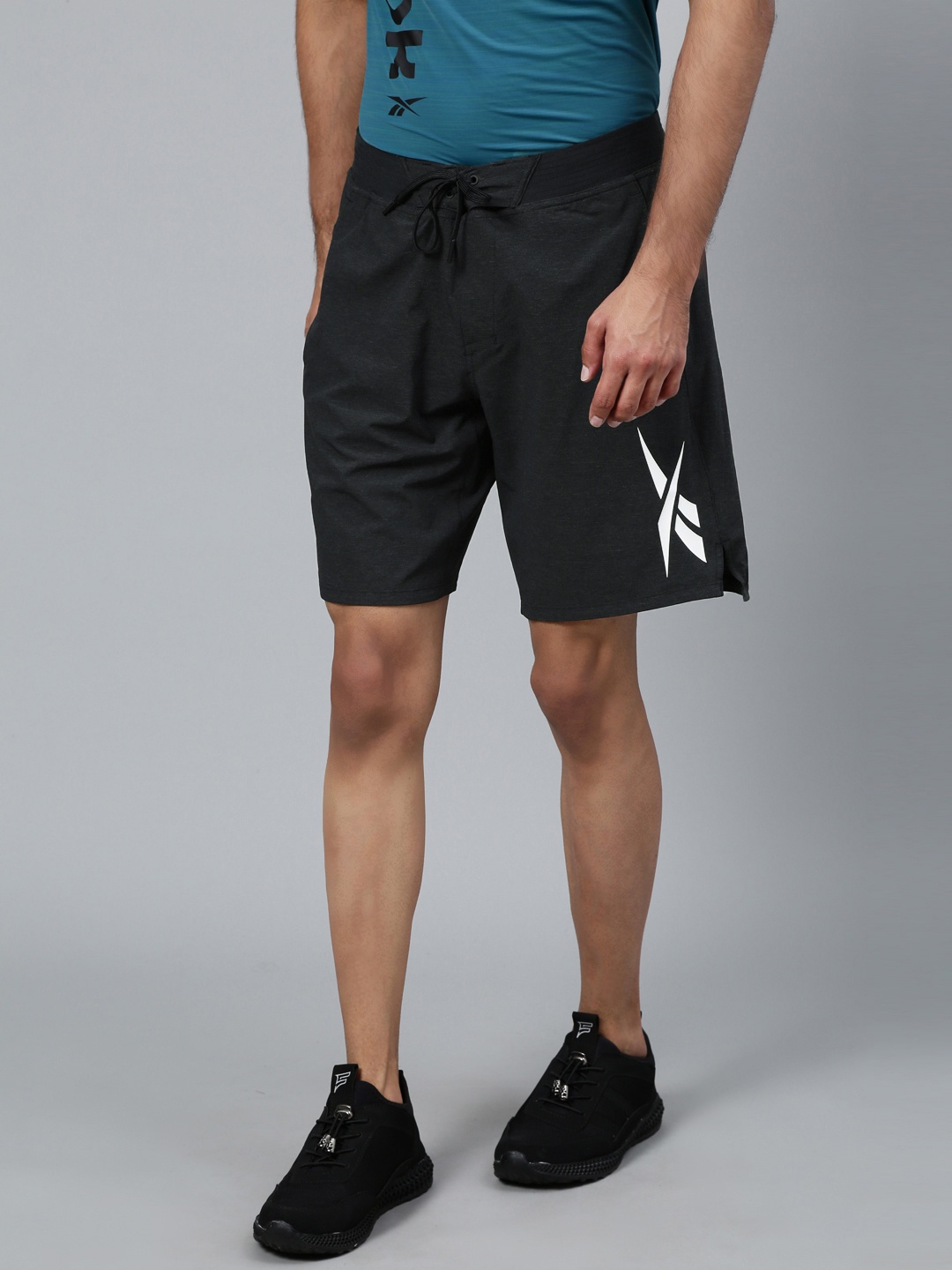 

Reebok Men Black Textured Epic Solid Training Shorts