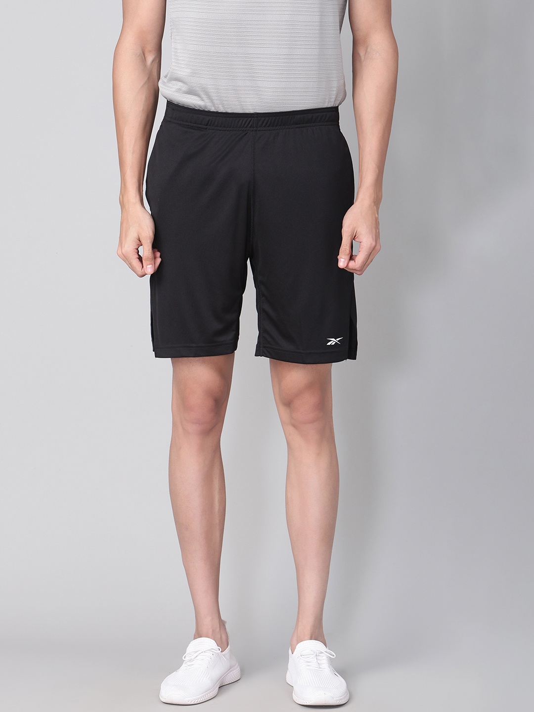 

Reebok Men Black Solid Training Wor Shorts