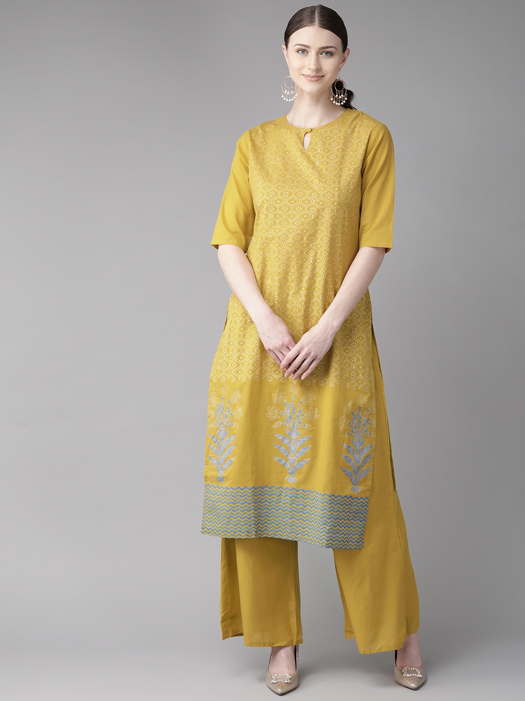 

Bhama Couture Women Mustard Yellow & Off-White Block Printed Kurta with Palazzos