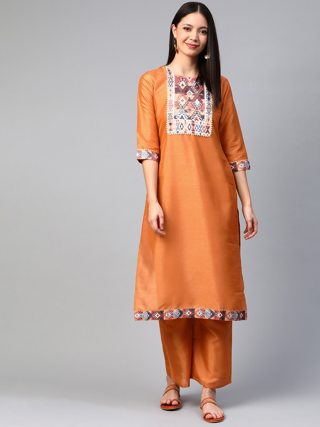 

ZIYAA Women Rust Orange Yoke Design Kurta with Palazzos