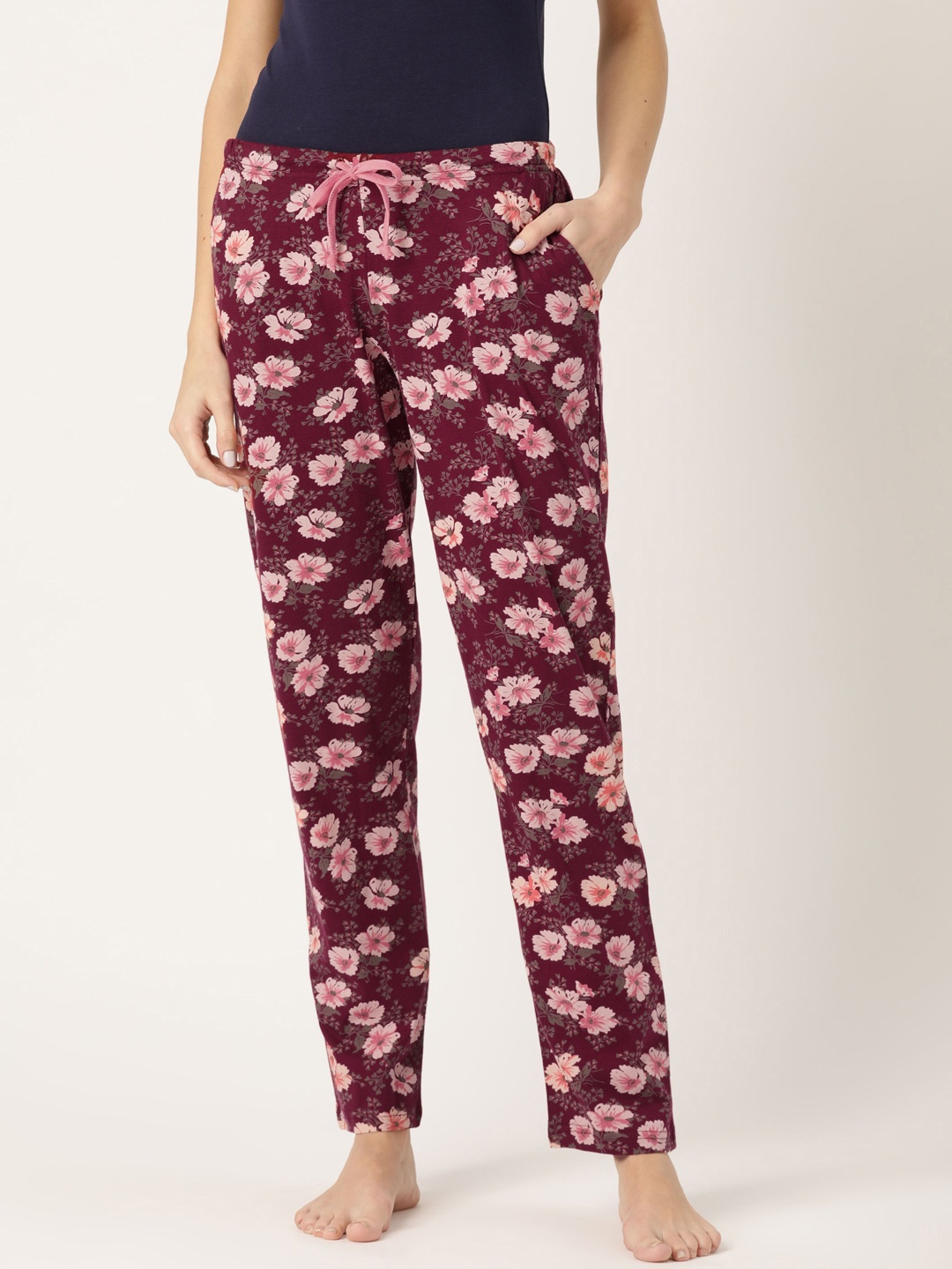 

Kanvin Women Orange & Black Floral Print Lounge Pants, Burgundy