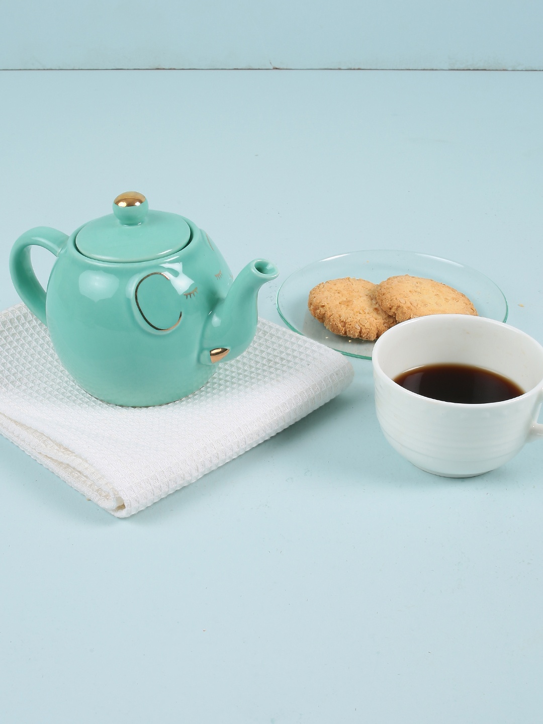 

Chumbak Sea Green Tasty Trunk Ceramic Kettle