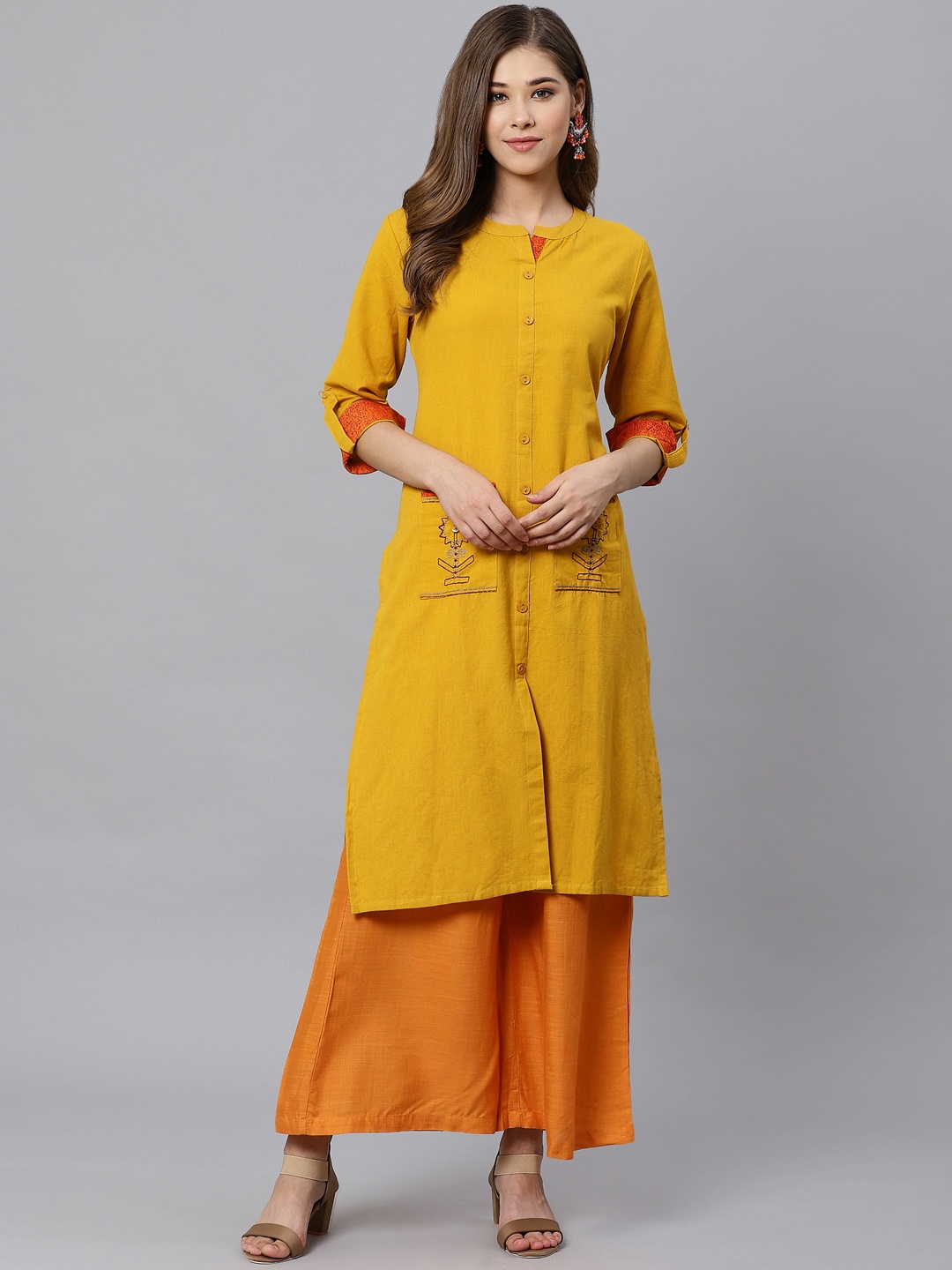 

Kifahari Women Mustard Yellow Solid A-Line Kurta