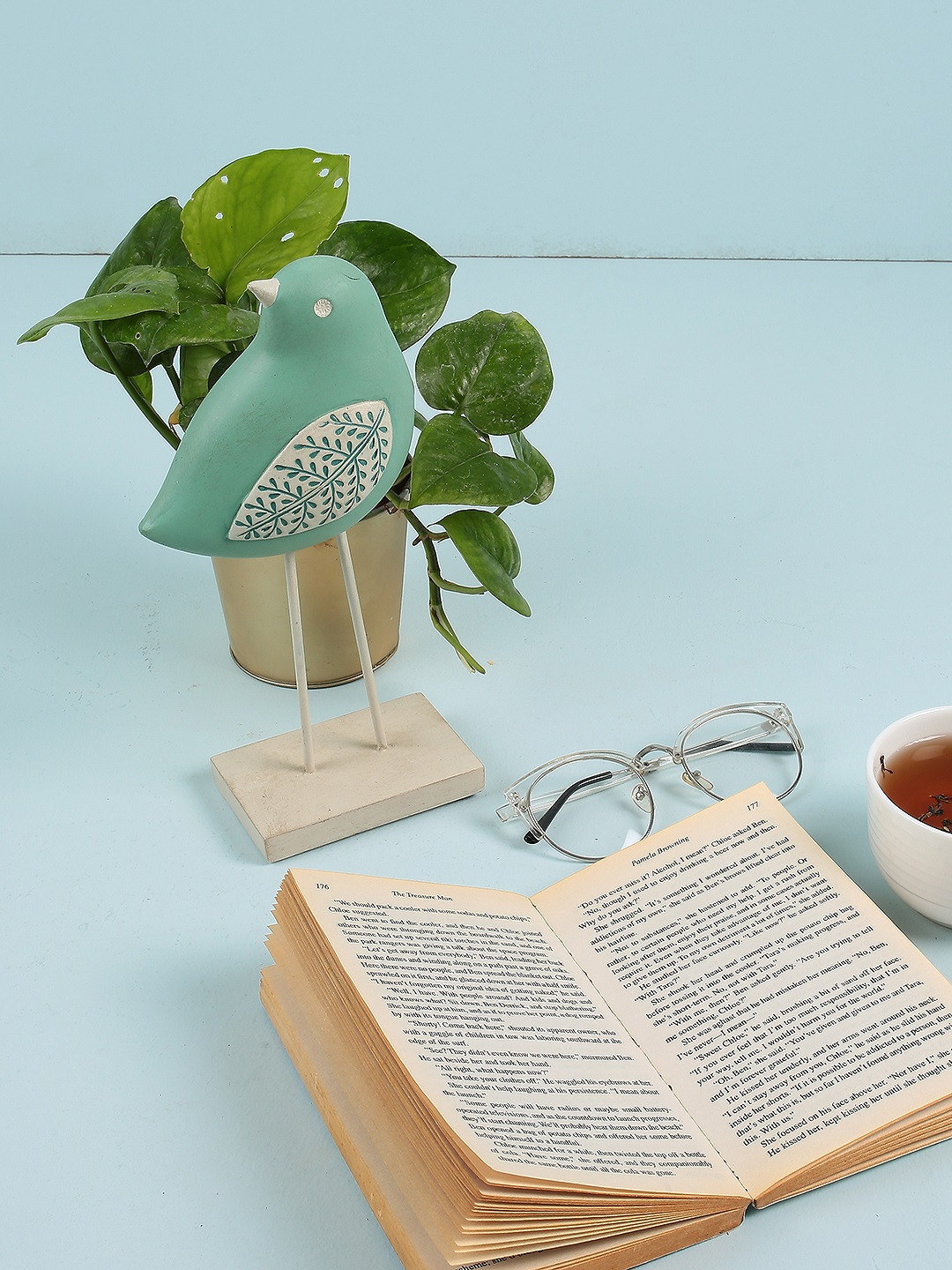 

Chumbak Green & Beige Polyresin Standing Tall Bird Figurine Showpiece