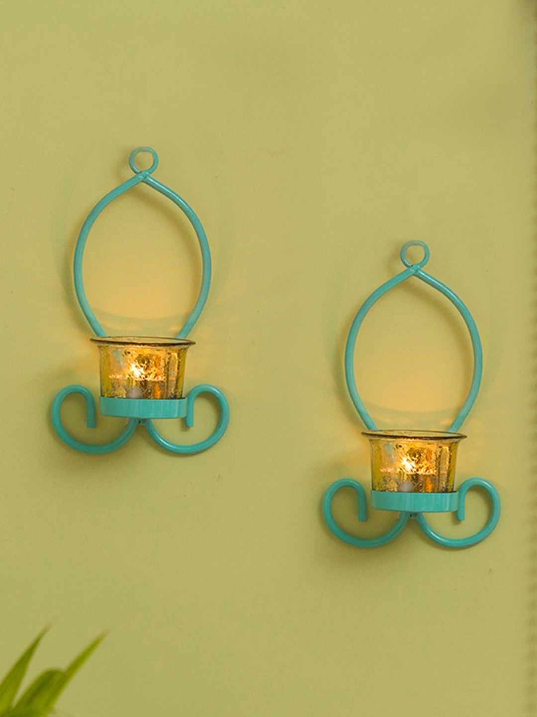 

ExclusiveLane Set of 2 Green Glowing Handcrafted Wall Sconce Iron Tea-Light Candle Holders
