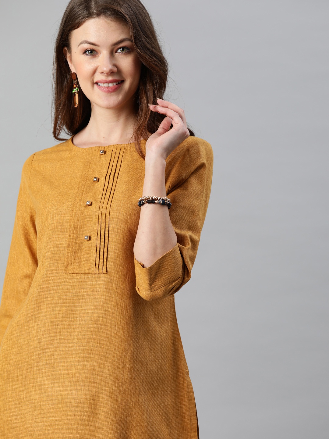 

Anouk Women Mustard Yellow Solid Straight Kurta