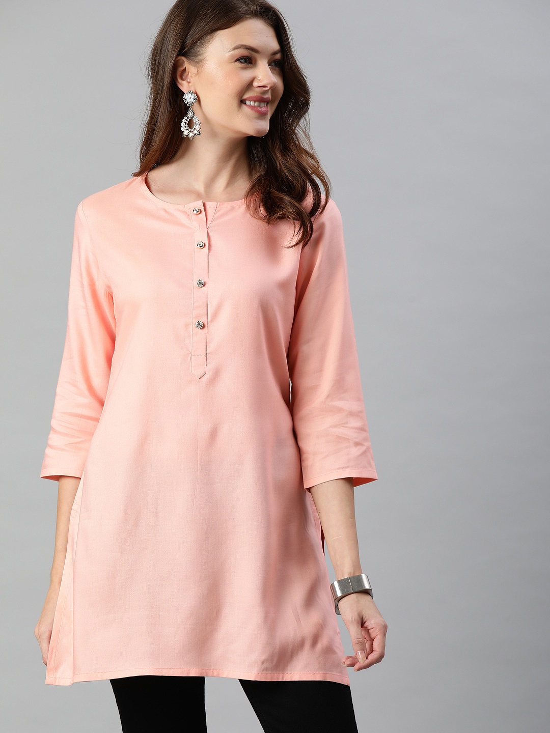 

Anouk Women Peach-Coloured Solid Straight Kurti