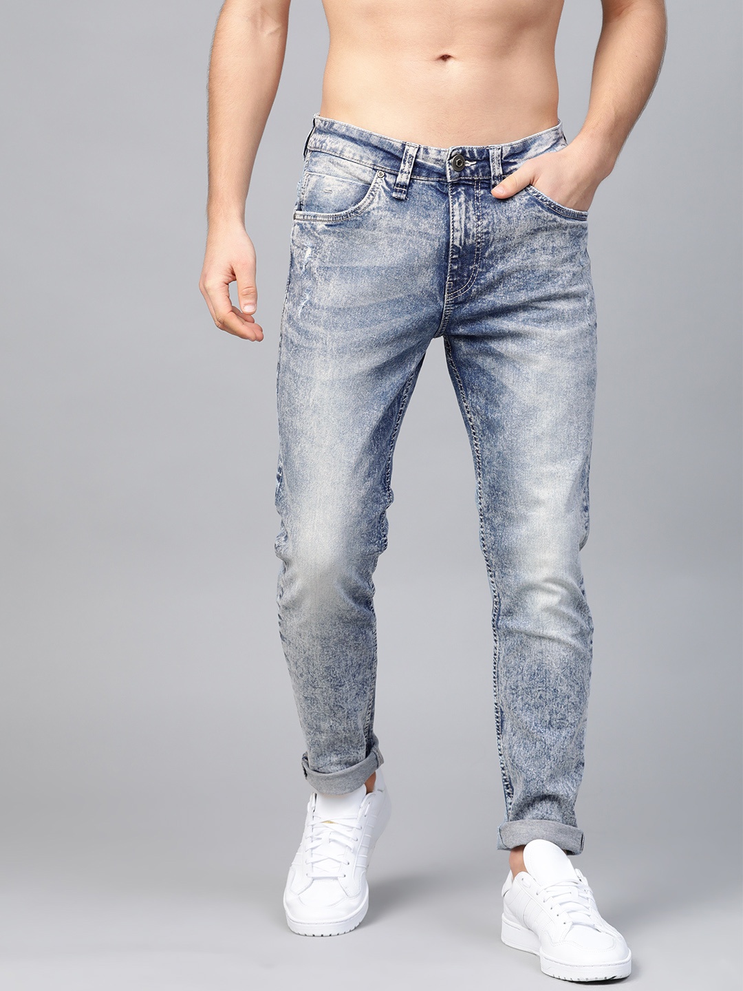 

Roadster Men Blue Slim Tapered Fit Mid-Rise Low Distress Acid Wash Stretchable Jeans