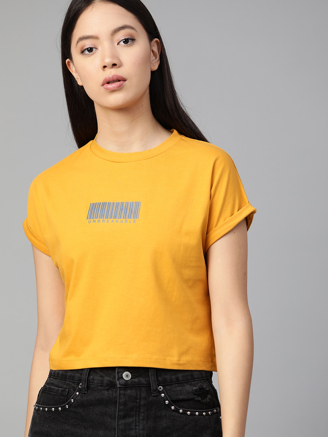 

Roadster Women Mustard Yellow Solid Round Neck Boxy Cropped T-shirt