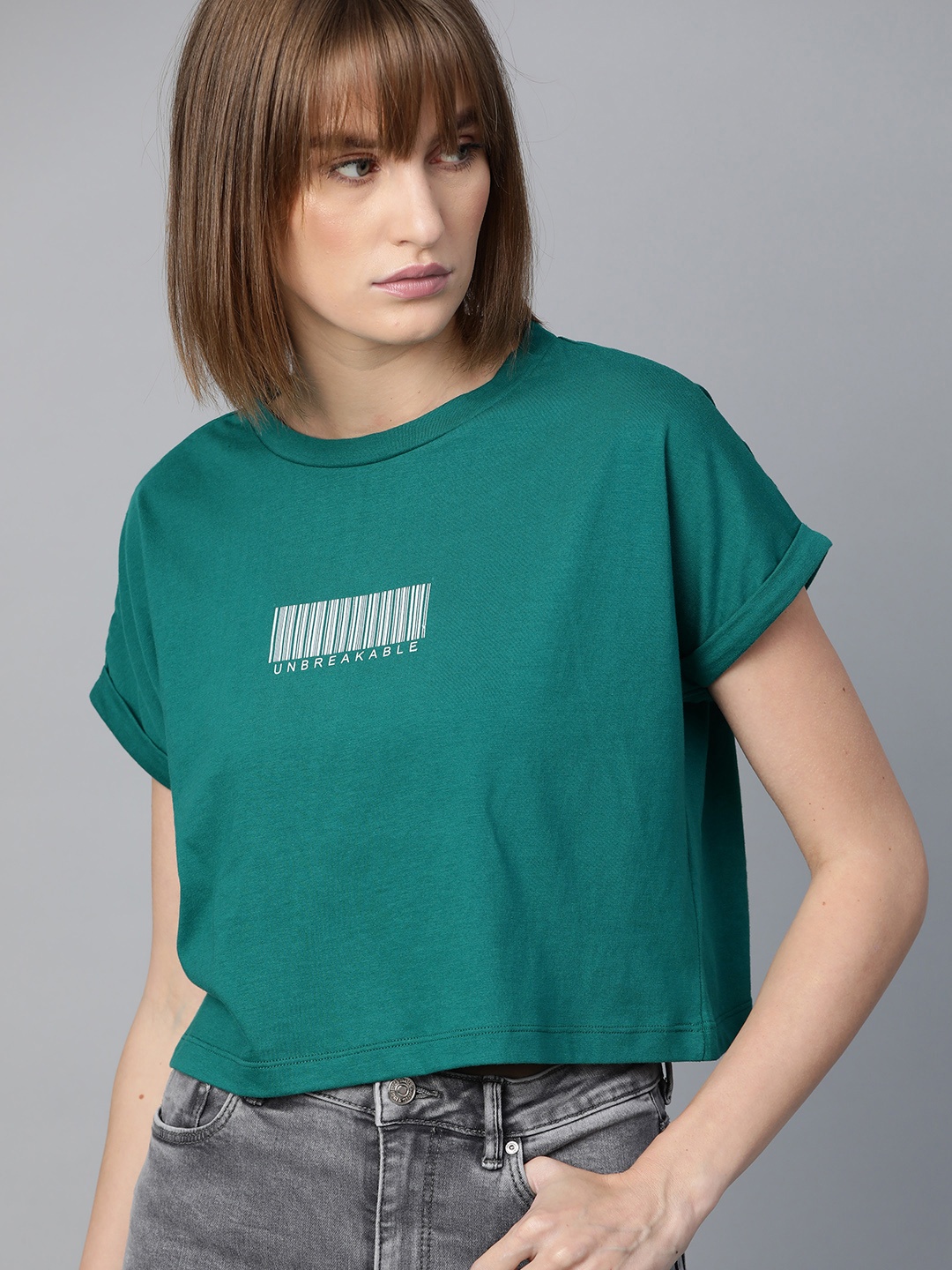 

Roadster Women Green Boxy Fit Solid Round Neck Crop T-shirt