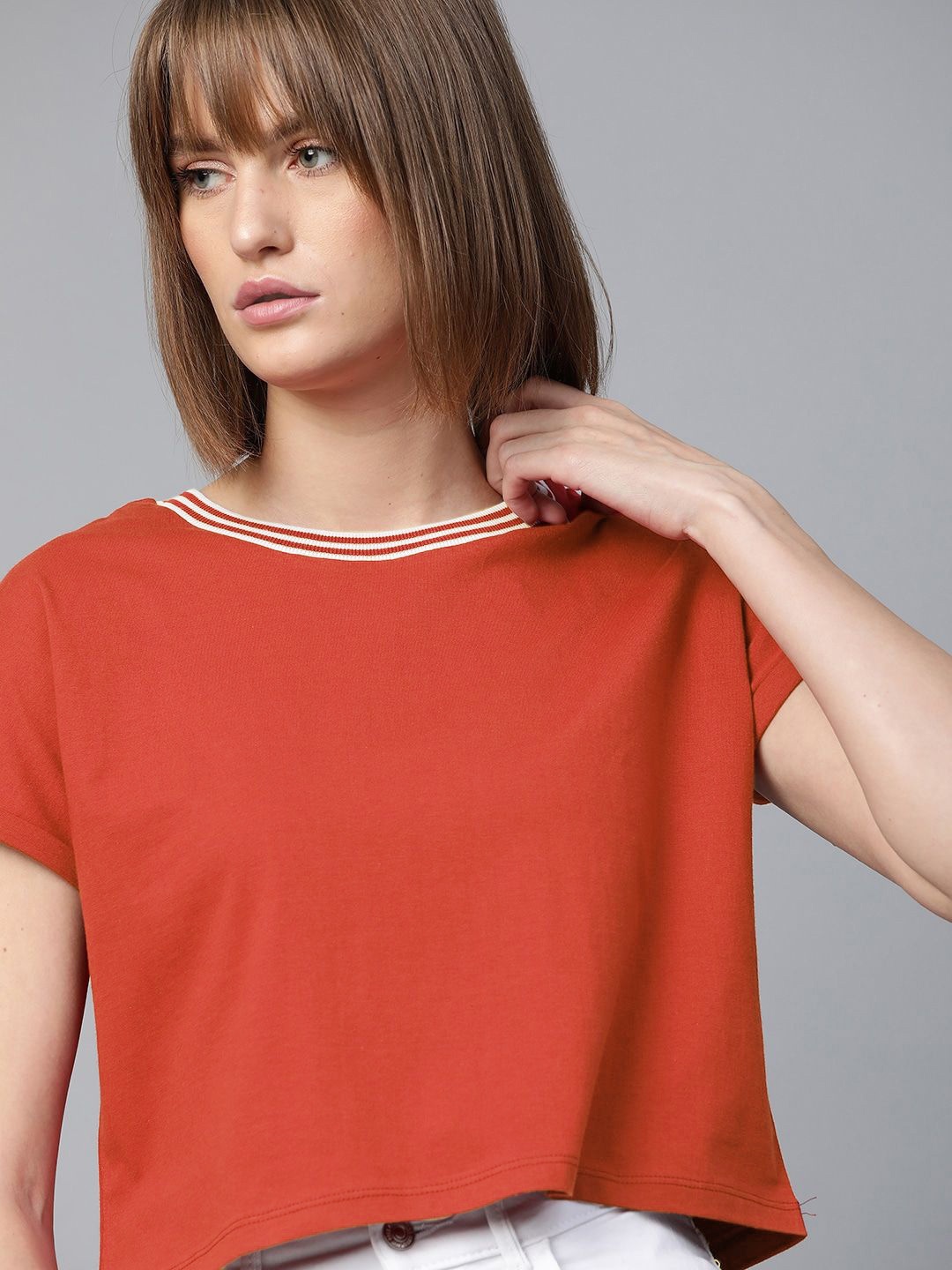 

Roadster Women Red Boxy Fit Solid Round Neck Crop T-shirt