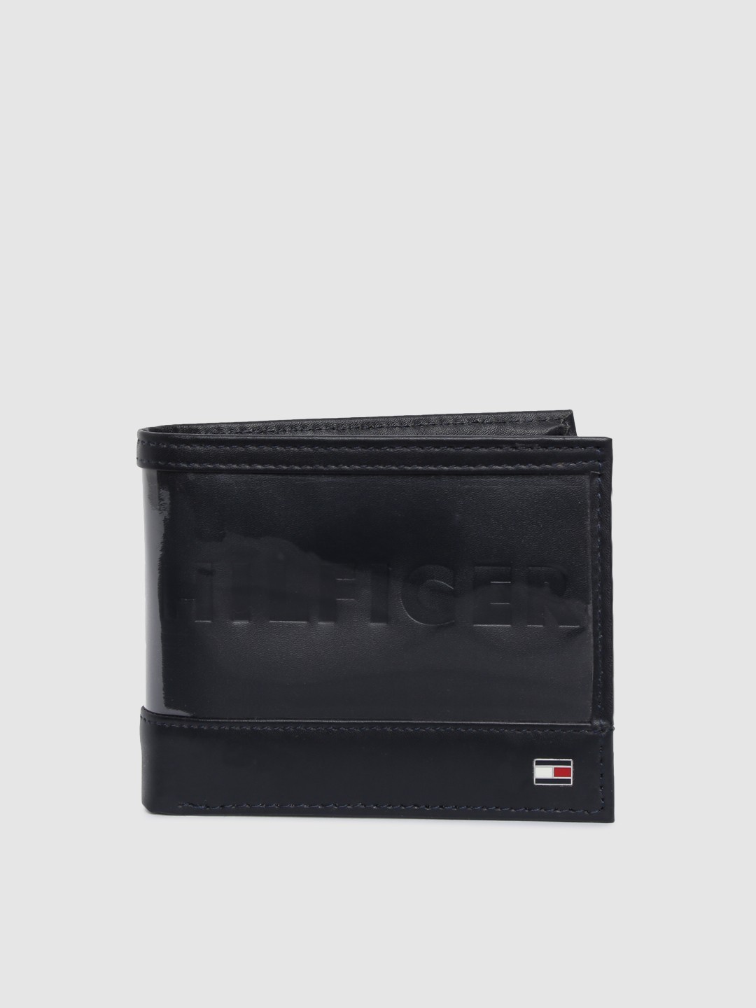 

Tommy Hilfiger Men Navy Blue Genuine Leather Two Fold Wallet