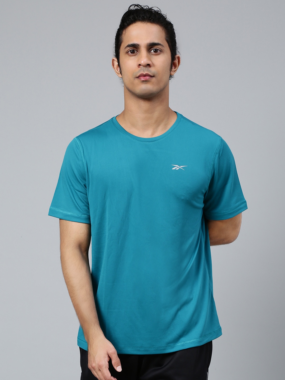 

Reebok Men Blue Colourblocked Running Essentials Short Sleeve T-Shirt