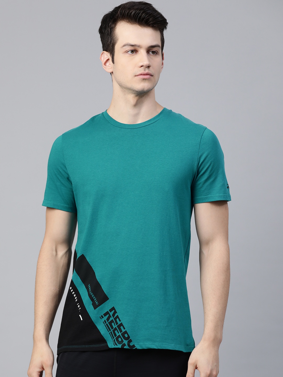 

Reebok Men Teal Green Black TS Archive Evo Q1 Pure Cotton Printed Training Pure Cotton T-shirt