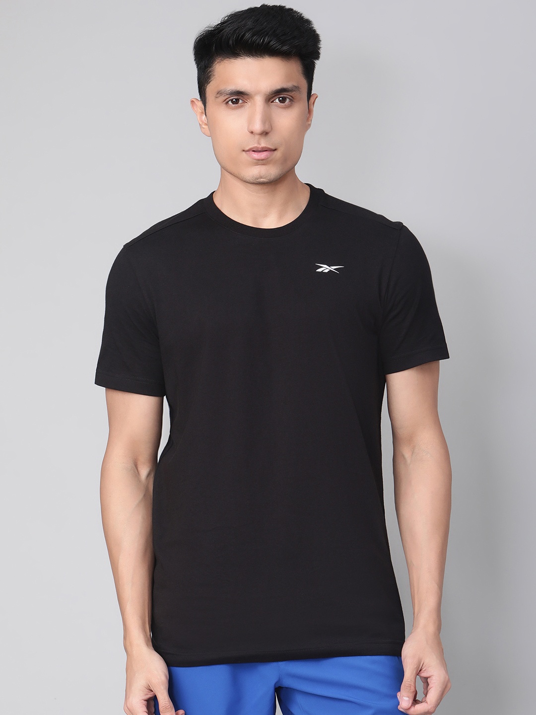 

Reebok Men Black Pure Cotton Slim Fit Solid Training Pure Cotton T-shirt