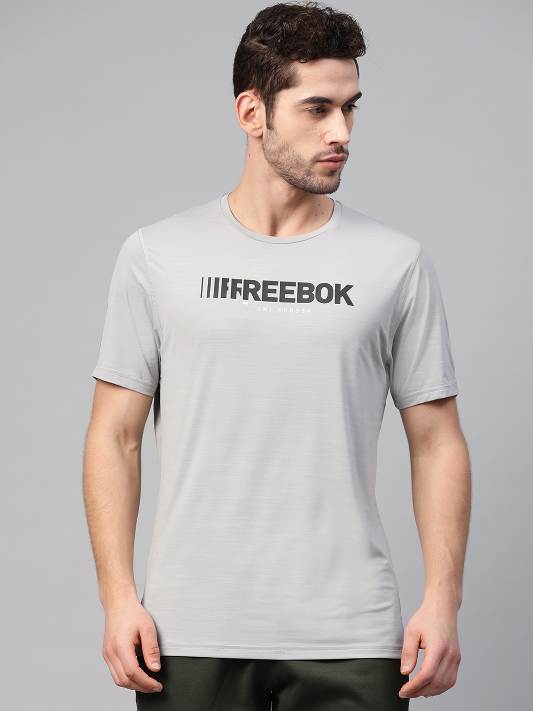

Reebok Men Grey Brand Logo Printed Activechill Graphic Move Q2 Training T-shirt