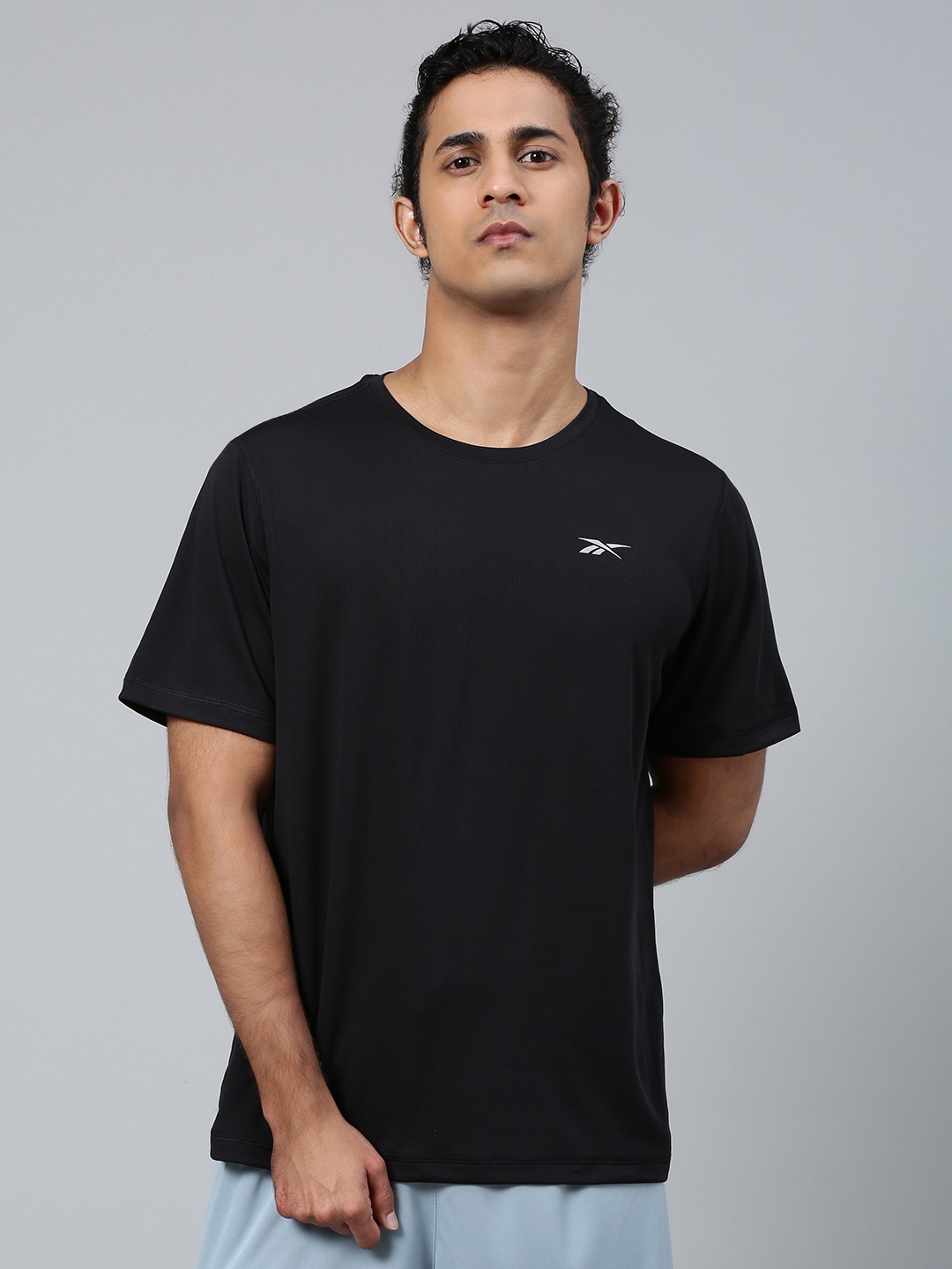 

Reebok Men Black Solid Running Essentials Short Sleeve T-Shirt