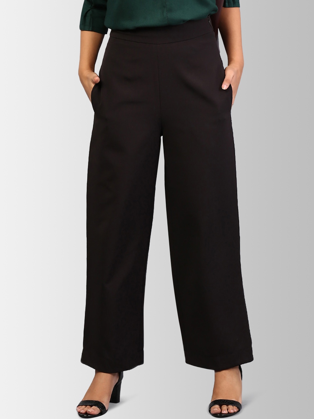 

FableStreet Women Black Flared Solid Parallel Trousers