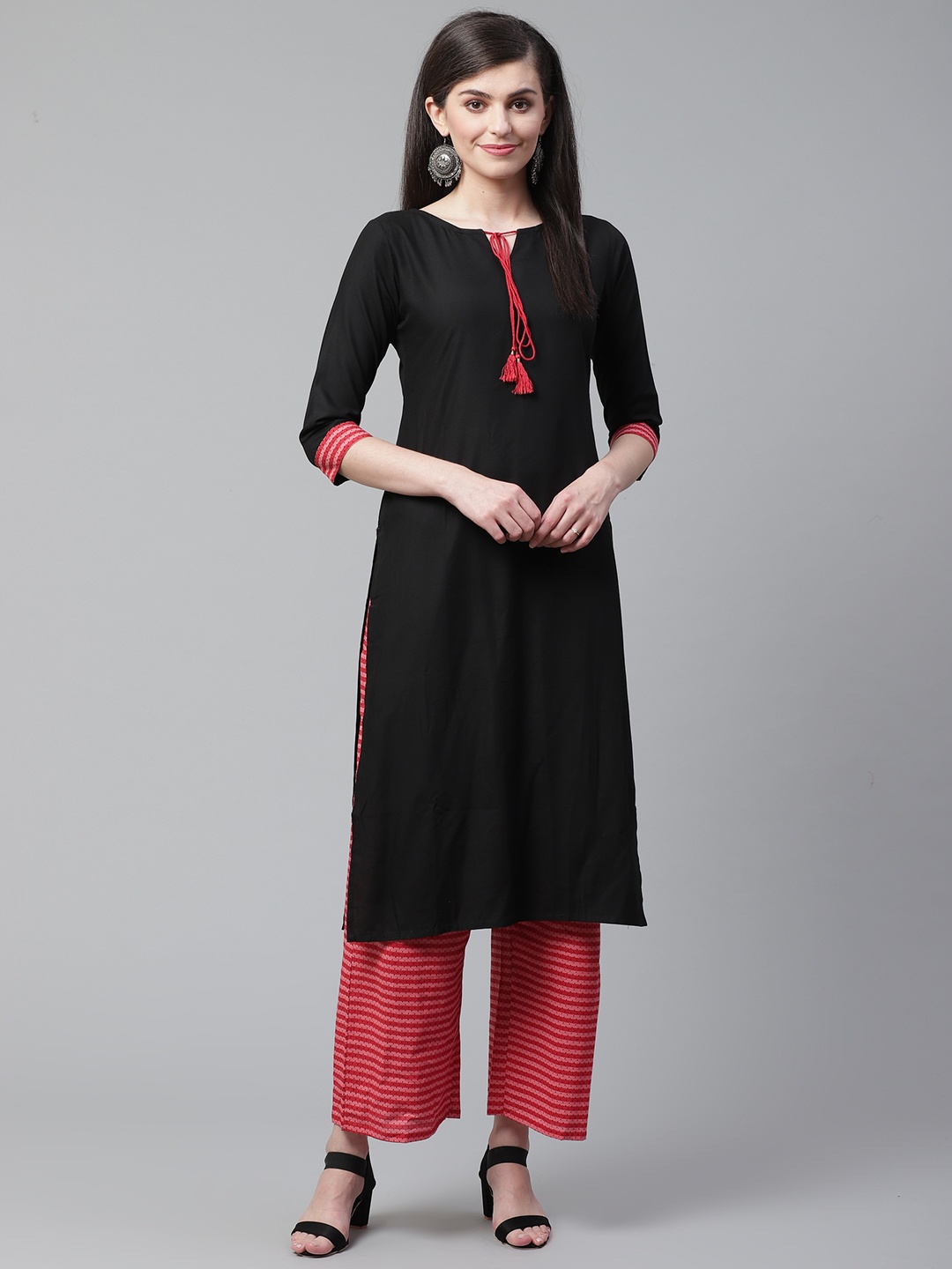 

Indo Era Women Black Solid Kurta with Palazzos
