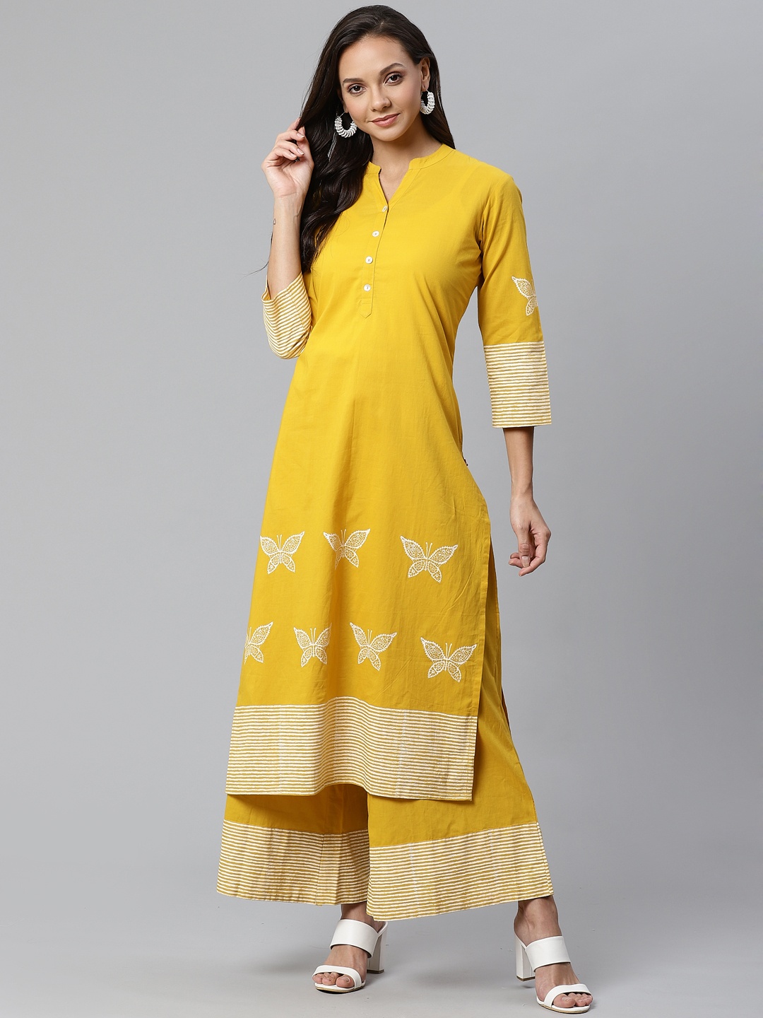 

Varanga Women Mustard Yellow & Off White Quirky Block Print Kurta with Palazzos