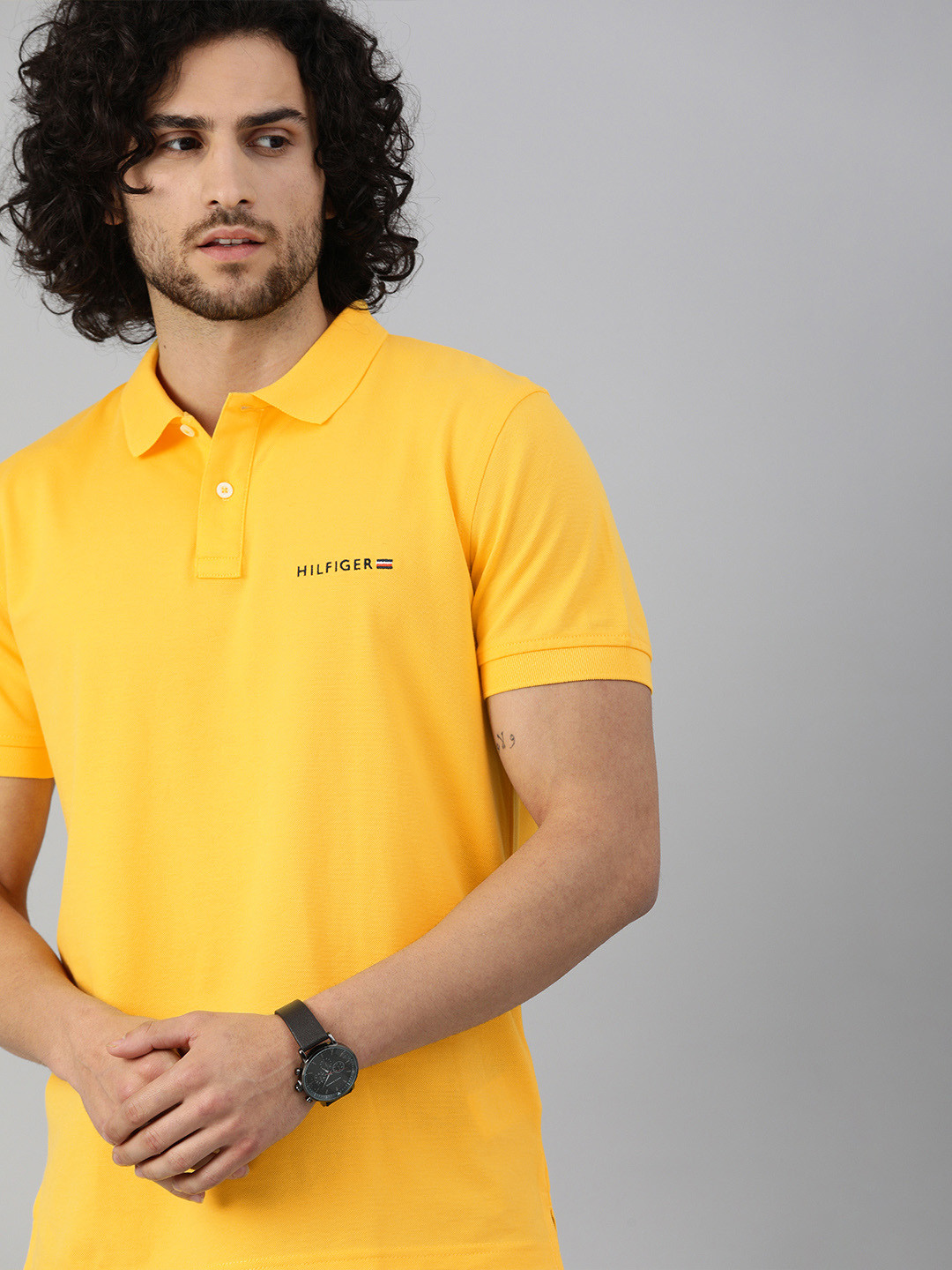 

Tommy Hilfiger Men Yellow Solid Brand Logo Applique Detail Polo Collar Cotton T-shirt