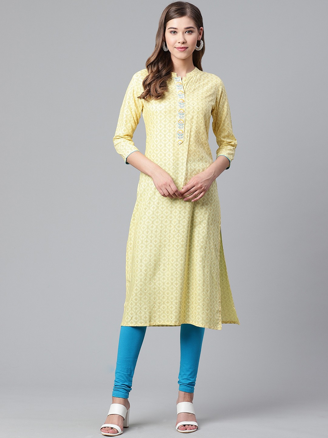 

Anubhutee Women Yellow Printed Straight Kurta