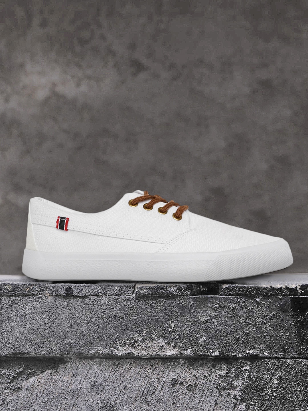 

Roadster Men White Solid Sneakers