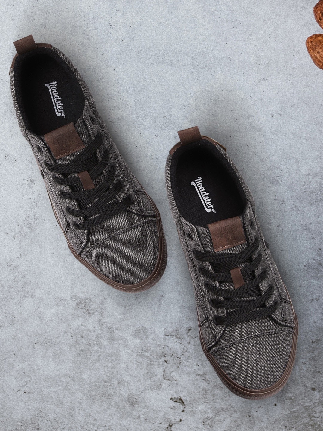 

Roadster Men Black Solid Sneakers