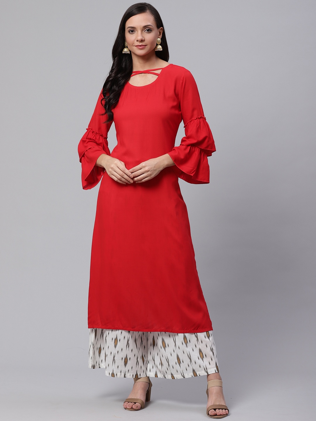 

Sringam Women Red & White Solid Kurta with Palazzos