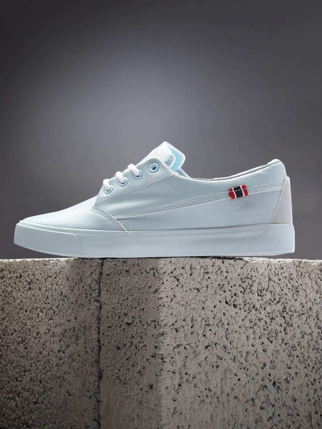 

Roadster Men Blue Solid Sneakers
