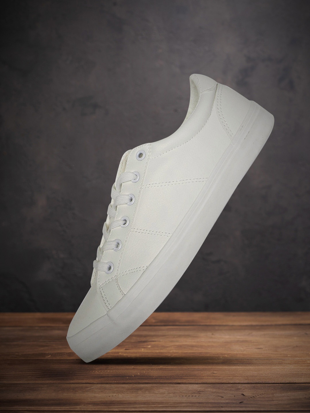 

Roadster Men White Solid Sneakers