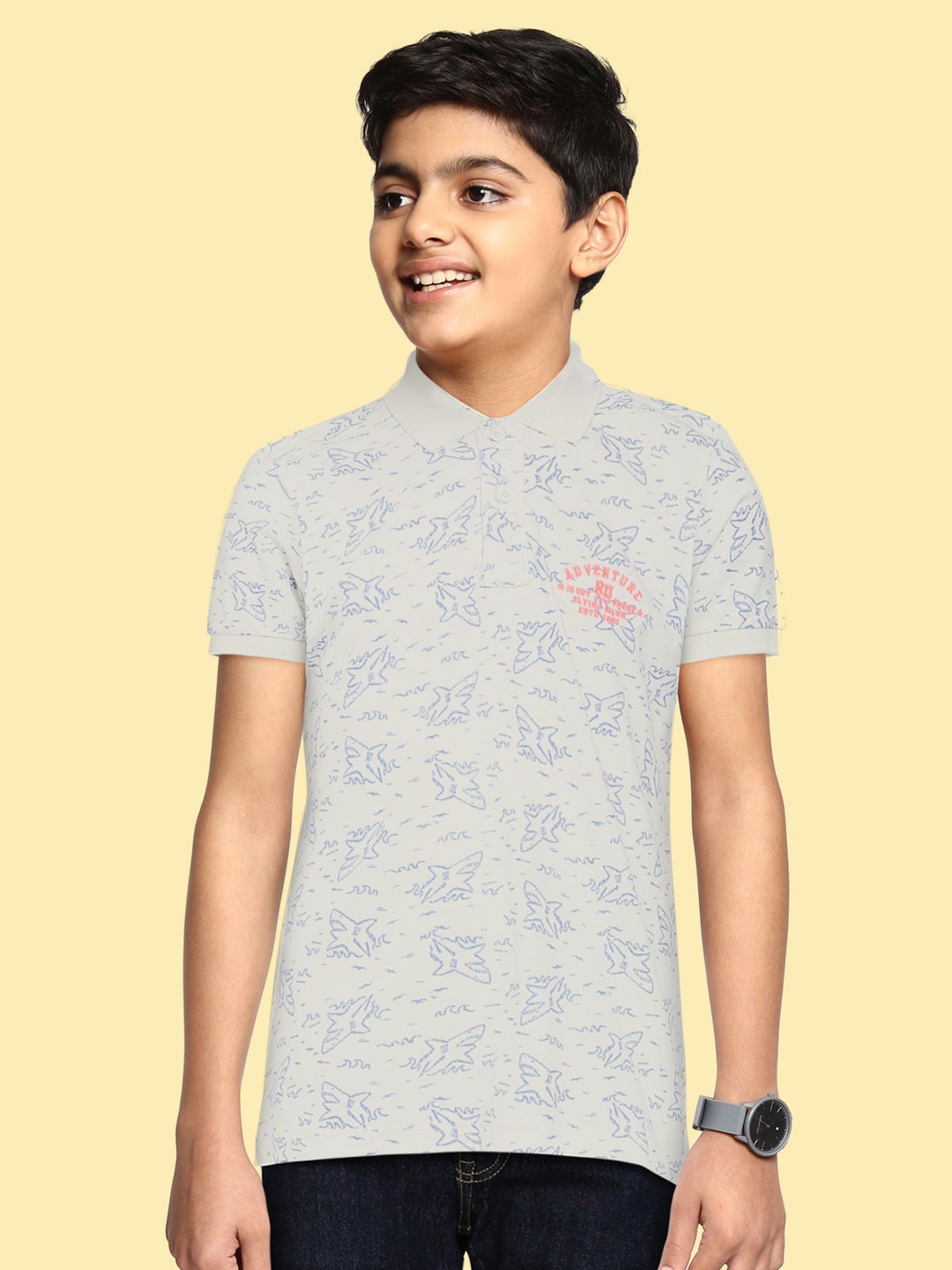 

Flying Machine Boys Off-White And Blue Printed Polo Collar T-shirt