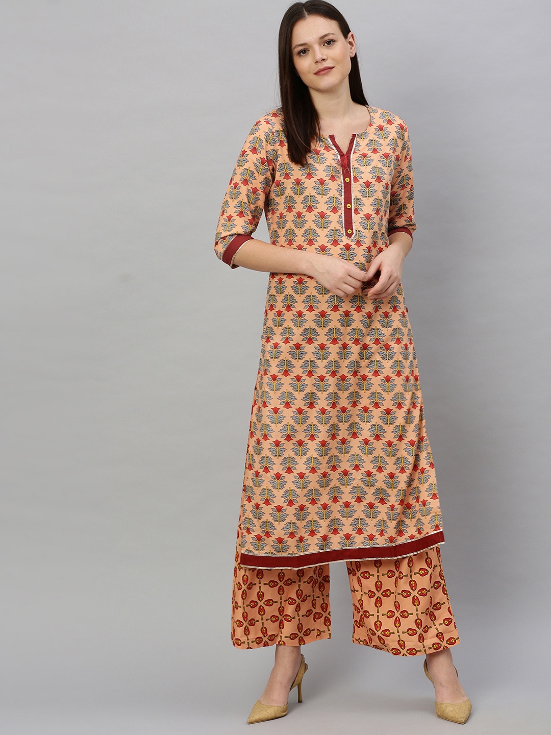 

Alena Women Peach-Coloured & Blue Printed Kurta with Palazzos