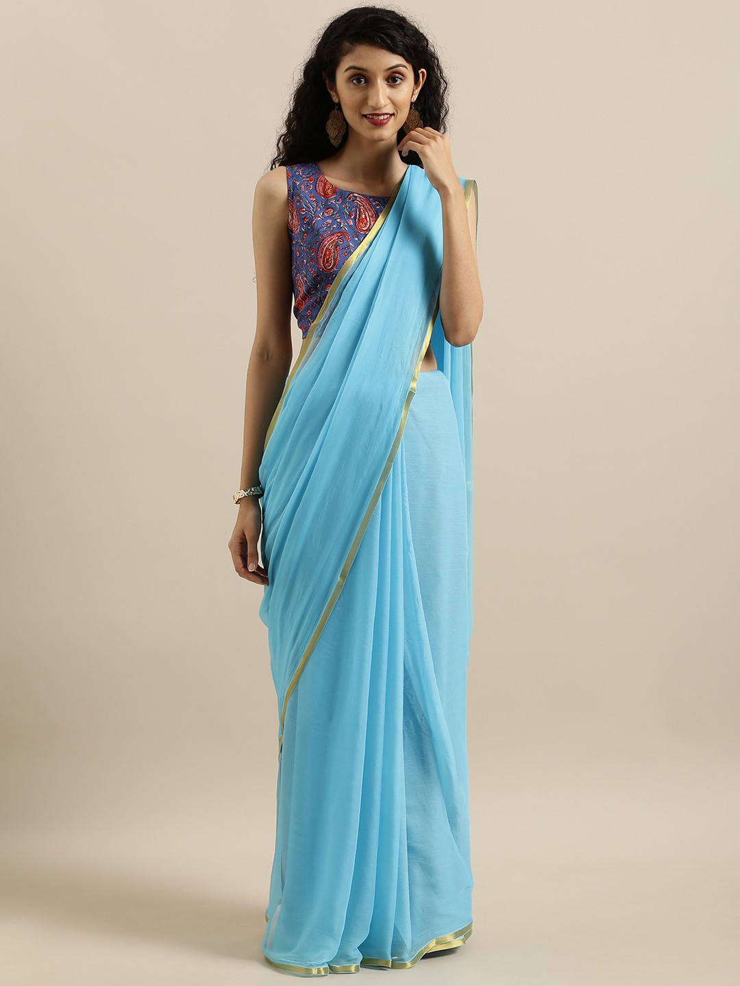 

Geroo Jaipur Hand Dyed Turquoise Blue Solid Chiffon Sustainable Saree With Hand Block Print Blouse