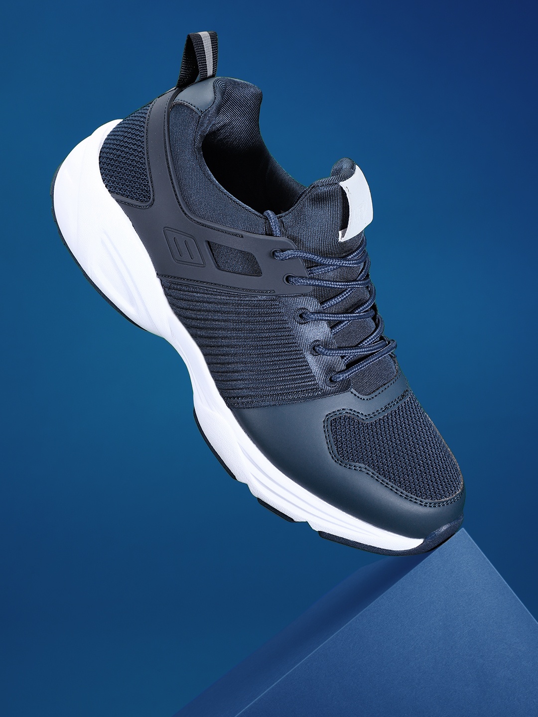 

HRX by Hrithik Roshan Men Navy Blue Self-Striped Street Running Shoes