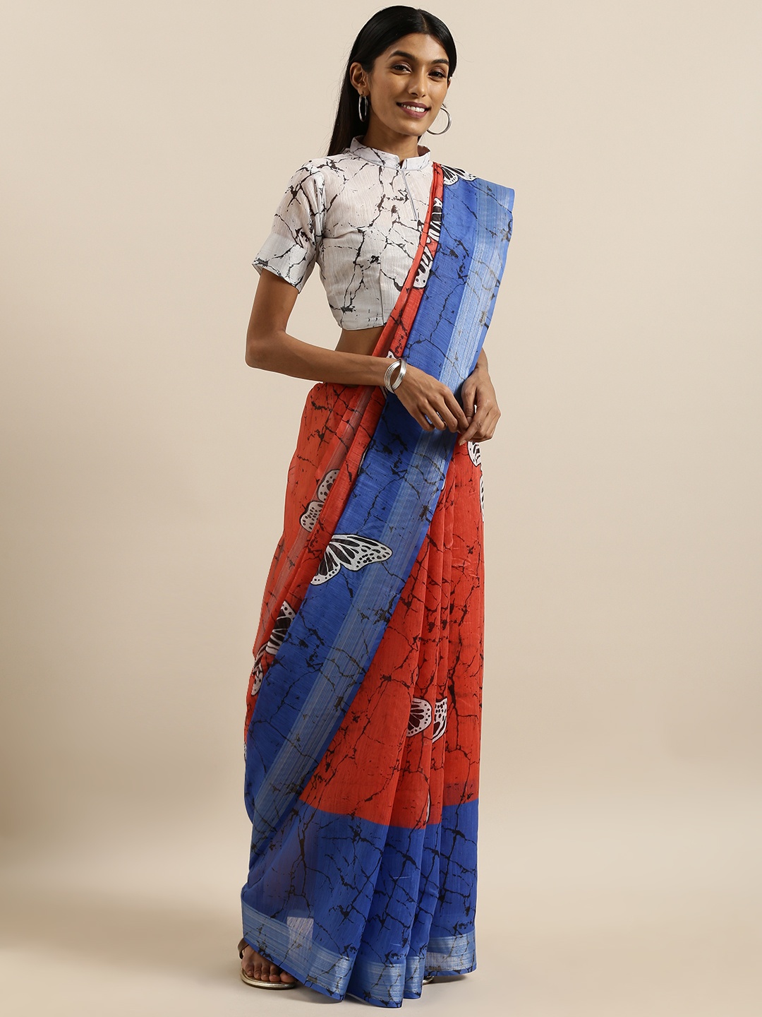 

SHAVYA Orange & Blue Linen Blend Printed Saree