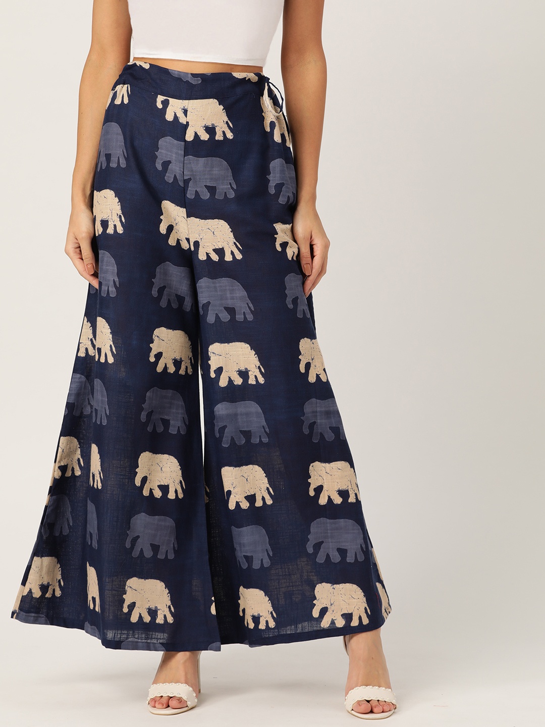 

InWeave Women Navy Blue & Beige Elephant Printed Wide Leg Palazzos