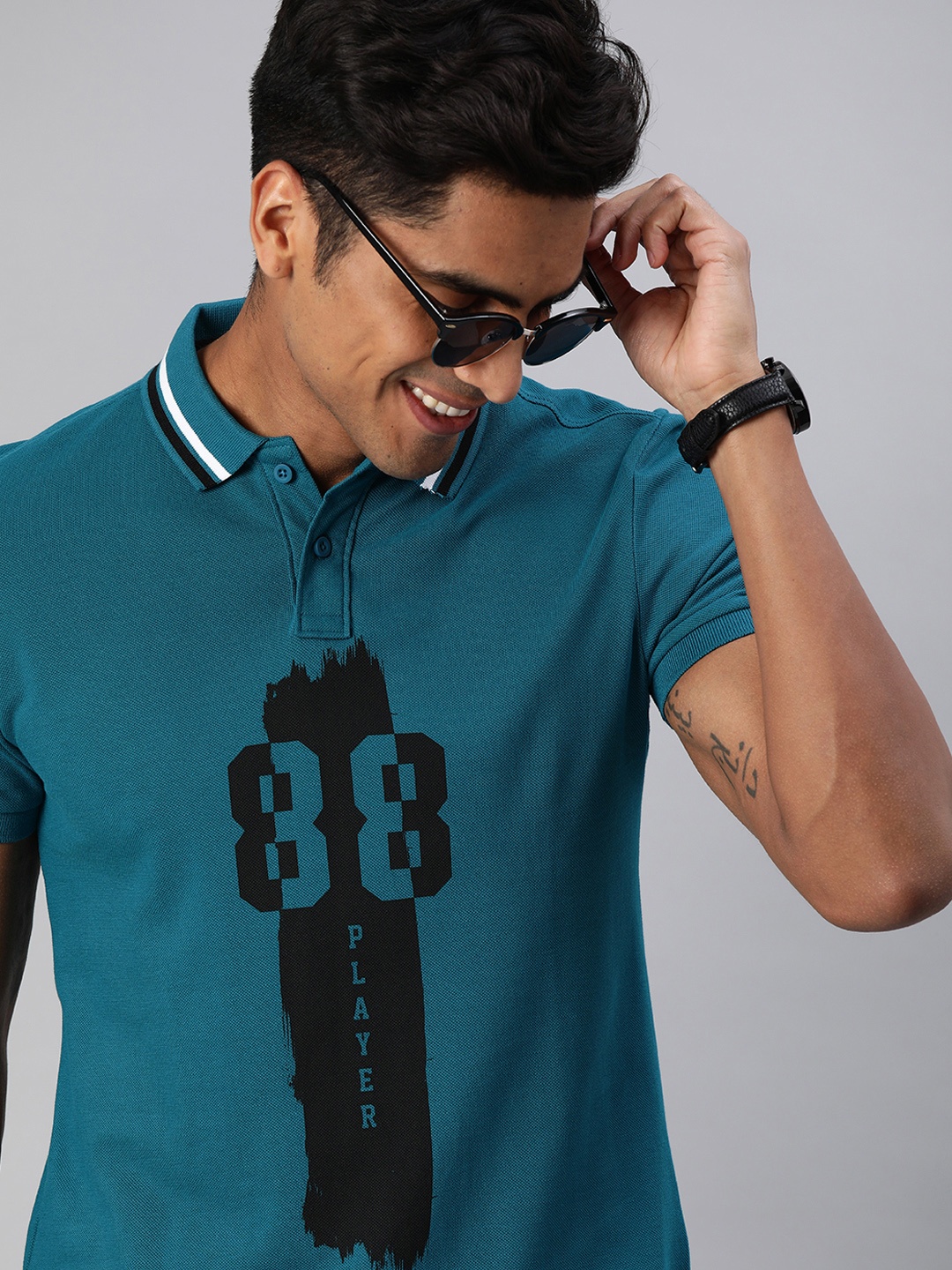

HERENOW Men Teal Blue Varsity Printed Polo Collar Pure Cotton T-shirt