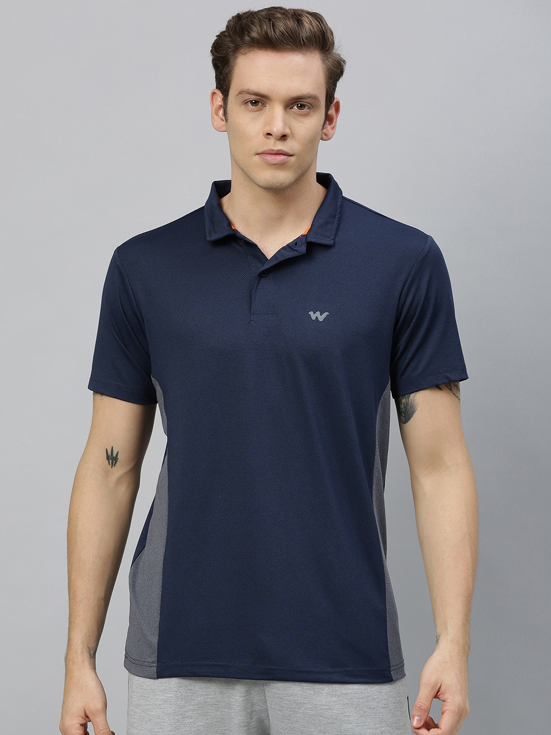 

Wildcraft Men Navy Blue Solid Polo Collar T-shirt With Striped Detailing