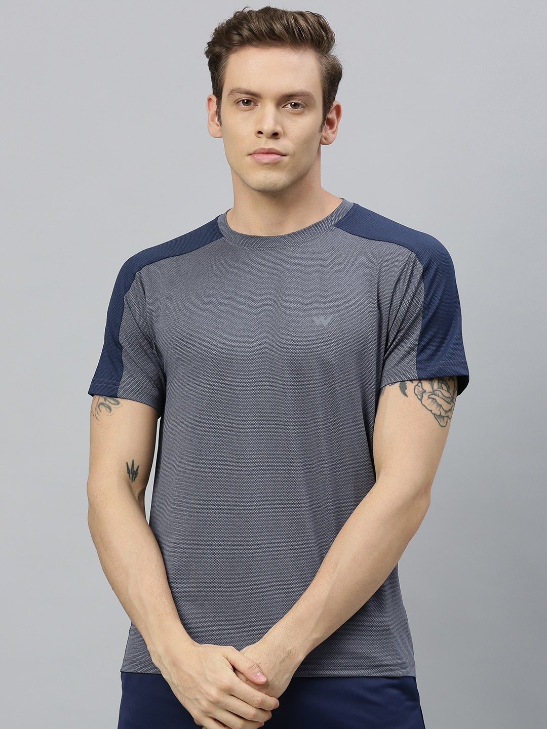 

Wildcraft Men Grey Solid Round Neck T-shirt With Striped Detailing