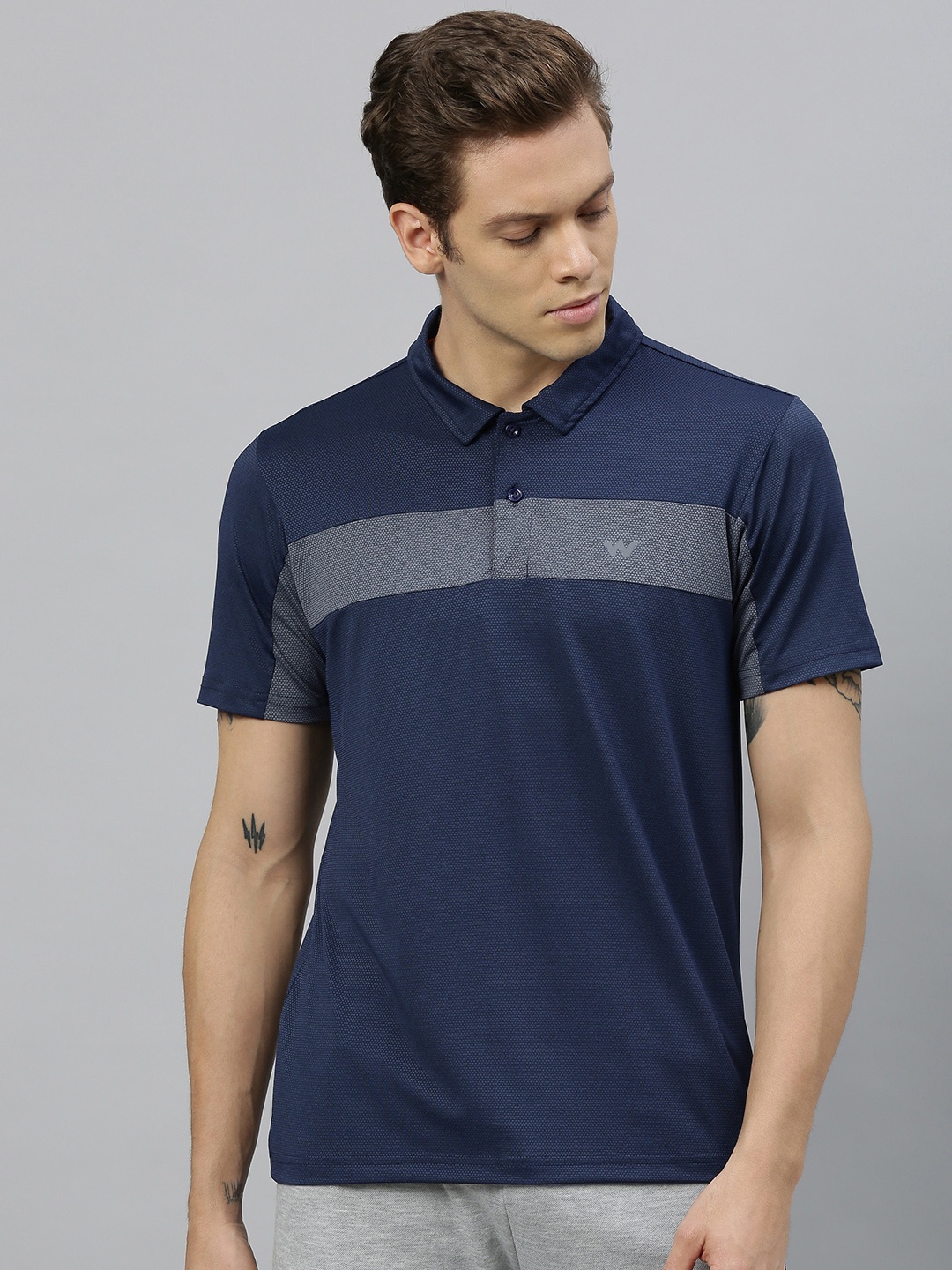 

Wildcraft Men Navy Blue & Grey Colourblocked Polo Collar T-shirt