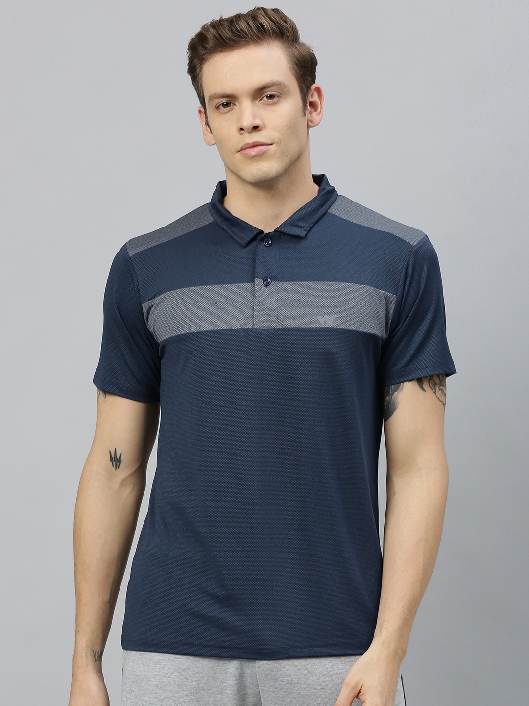 

Wildcraft Men Navy Blue Striped Polo Collar T-shirt With Striped Detailing