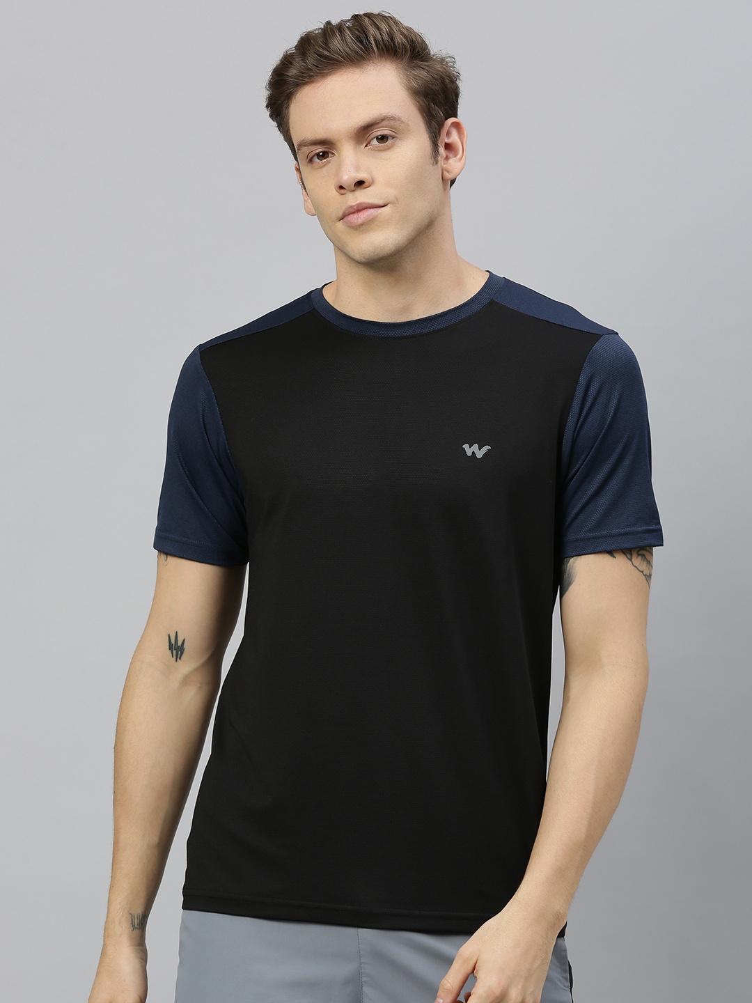 

Wildcraft Men Black Solid Round Neck T-shirt With Contrast Sleeves